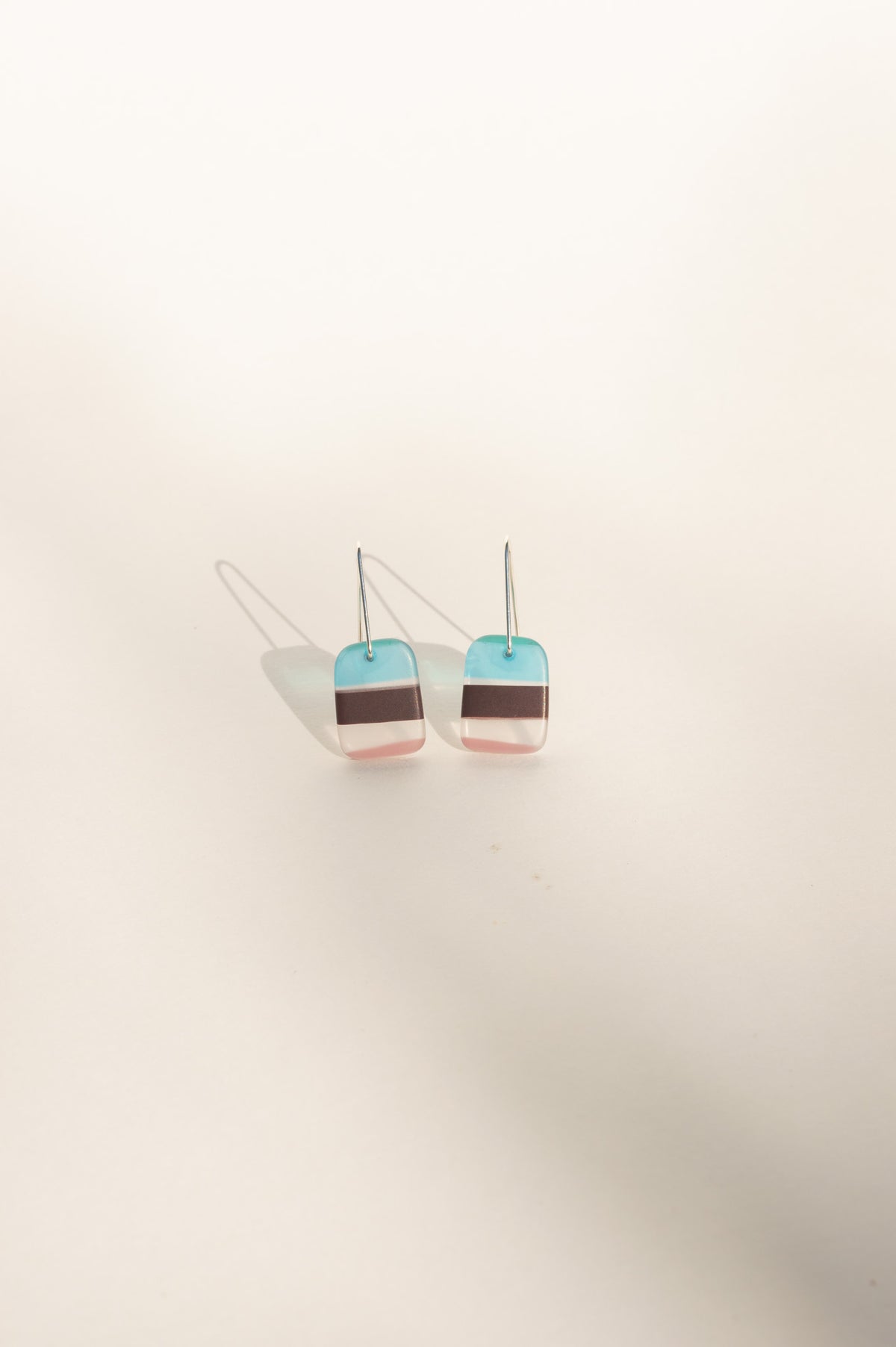 Daydream 4 small earrings with aqua, cocoa and blush pink stripes in upcycled surfboard resin