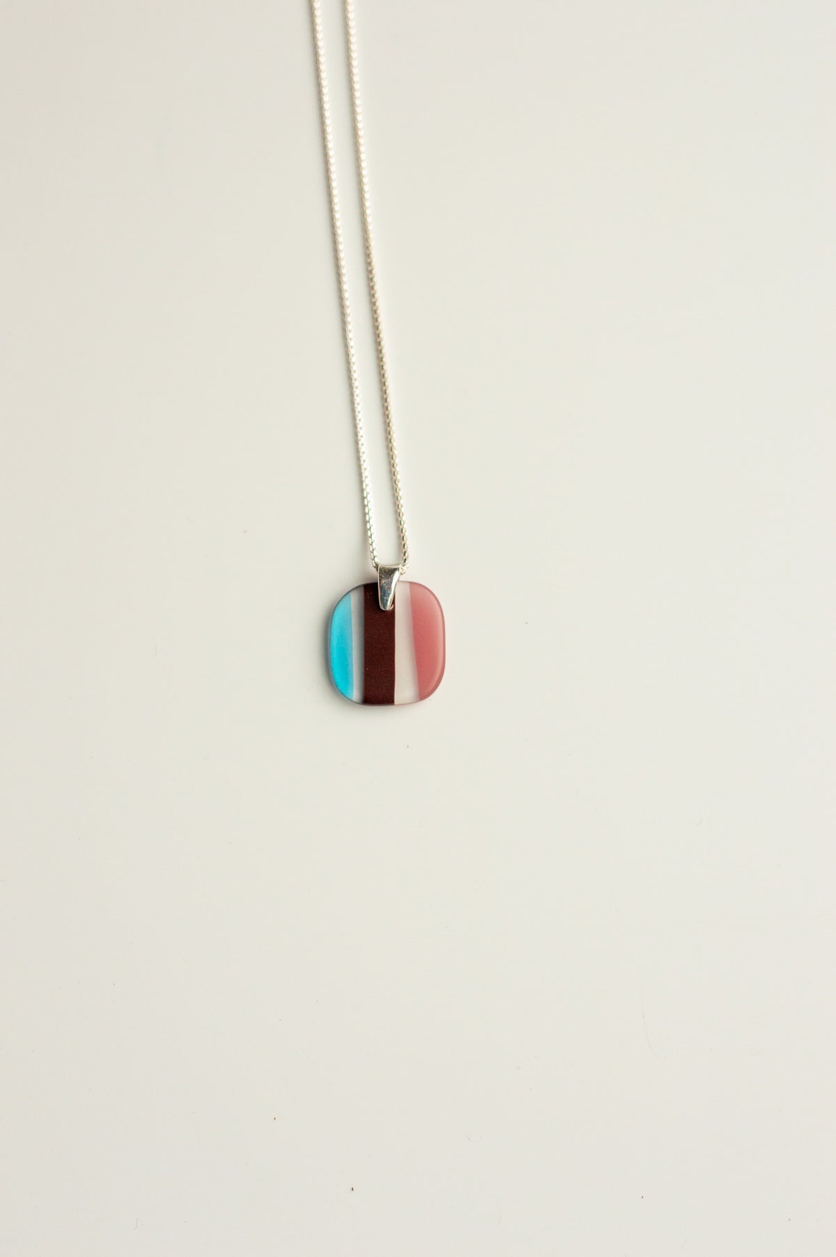 Daydream Necklace 1 pendant in aqua, cocoa and pink upcycled surfboard resin on a sterling silver chain